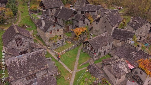 Swiss village Foroglio featuring old stone homes in vivid autumn landscape.