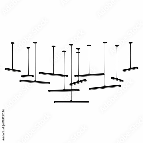 A modern installation of minimalist black T-shaped pendant lights.