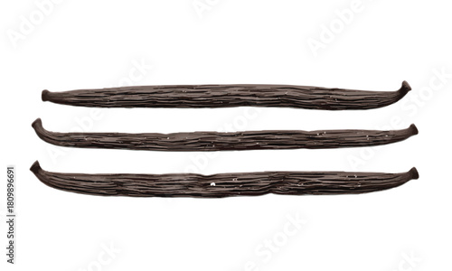 Isolated vanilla bean pod sticks and brown spices on a white background