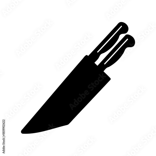 Iconic silhouette of two kitchen knives in a chef's block