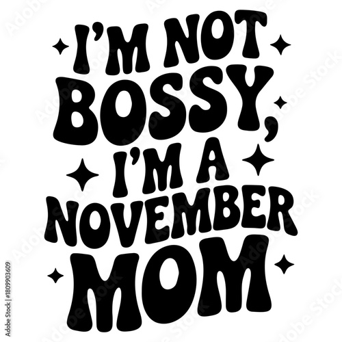 Black lettering reads i am not bossy i am a november mom with star accents on a white background design