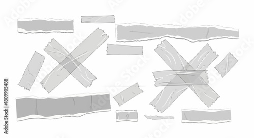 Collection of various ripped paper pieces and adhesive tape strips.