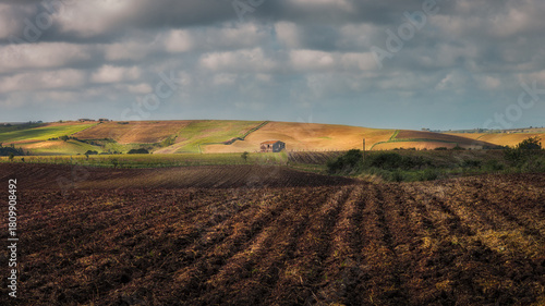 The Geometry of the Land A Farmhouse Nestled in the Hills