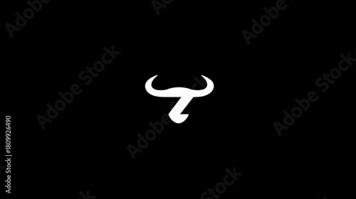 Stylized bull head silhouette graphic, white on black background. Modern abstract bovine icon, powerful and strong animal design.