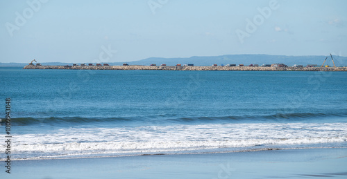 Fototapeta Naklejka Na Ścianę i Meble -  Building at sea wave barrier