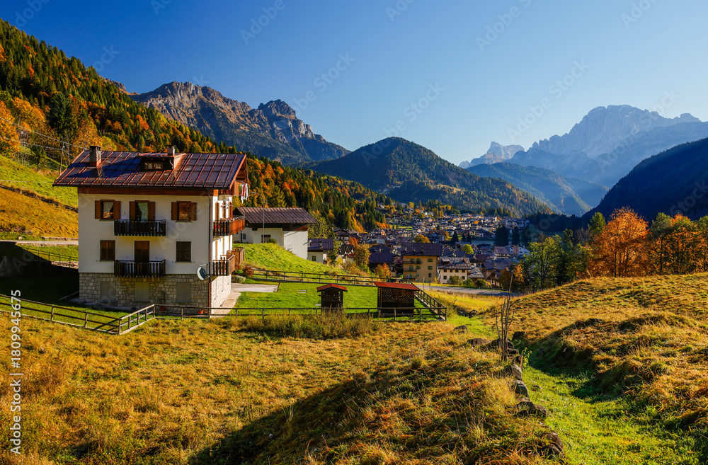 Fototapeta premium Scenic view of a traditional chalet in the Dolomites mountains, Italy, Europe 