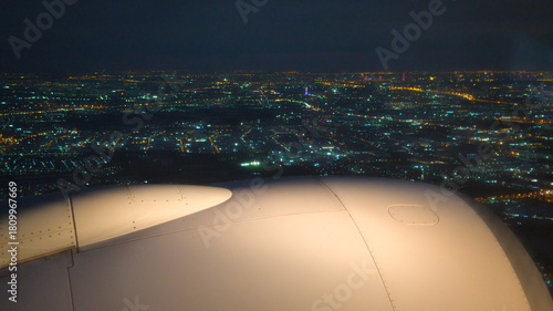 Photography A plane landing at Dubai Airport, United Arab Emirates, at sunrise
