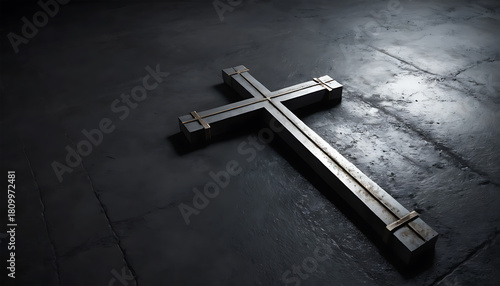 Metal Cross on Dark Concrete Floor in Dim Lighting Religious Symbol