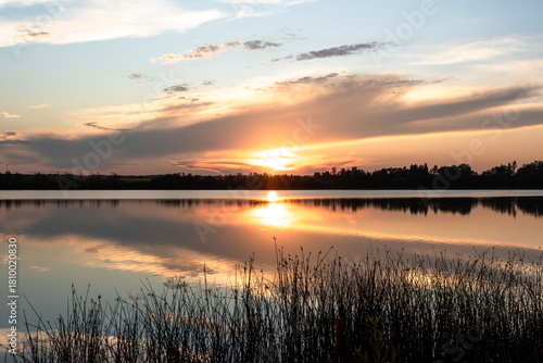 Peaceful summer sunset view at Lacombe Lake, Alberta
