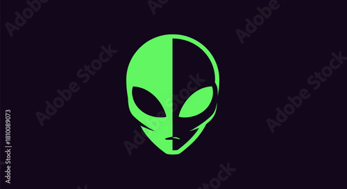 Graphic image features a stylized alien head, divided vertically by green and black halves