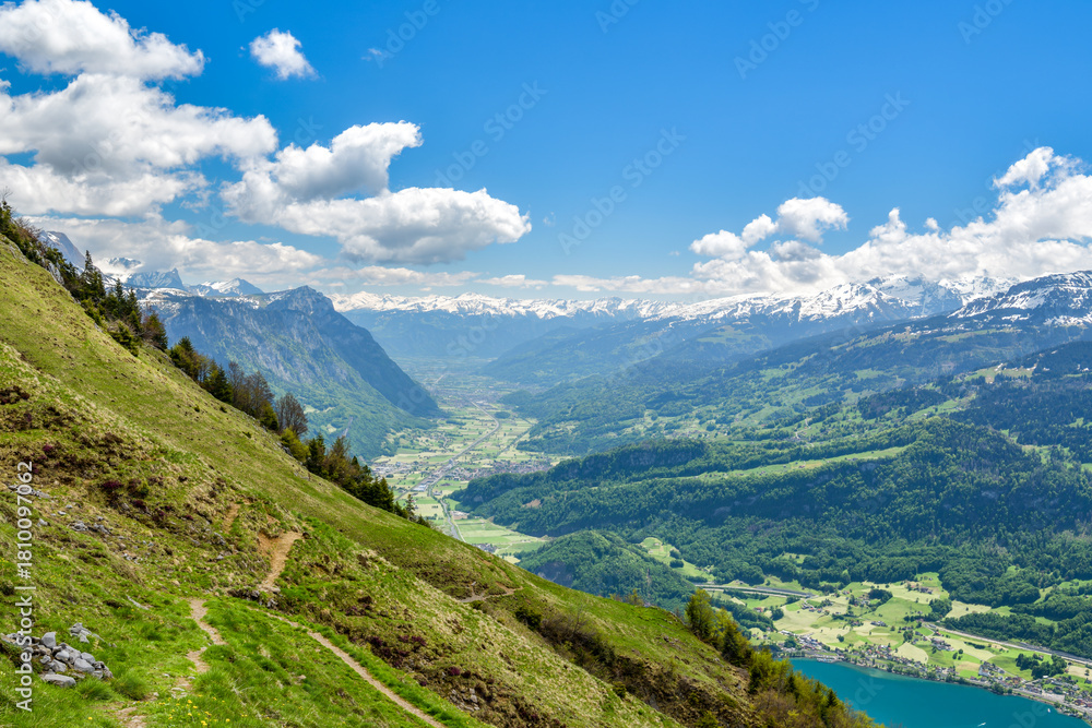 Naklejka premium Walking trail above Walensee lake in Switzerland