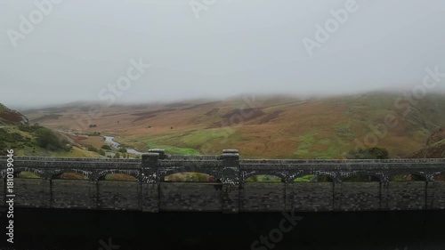 Autumn over Craig Goch Dam from a drone, Elan Valley Reservoirs, Elan Valley, Rhayader, Powys, Wales