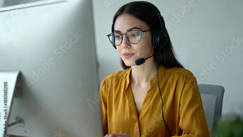 Wallpaper Mural Woman with headset working on computer, customer service or call center concept Torontodigital.ca