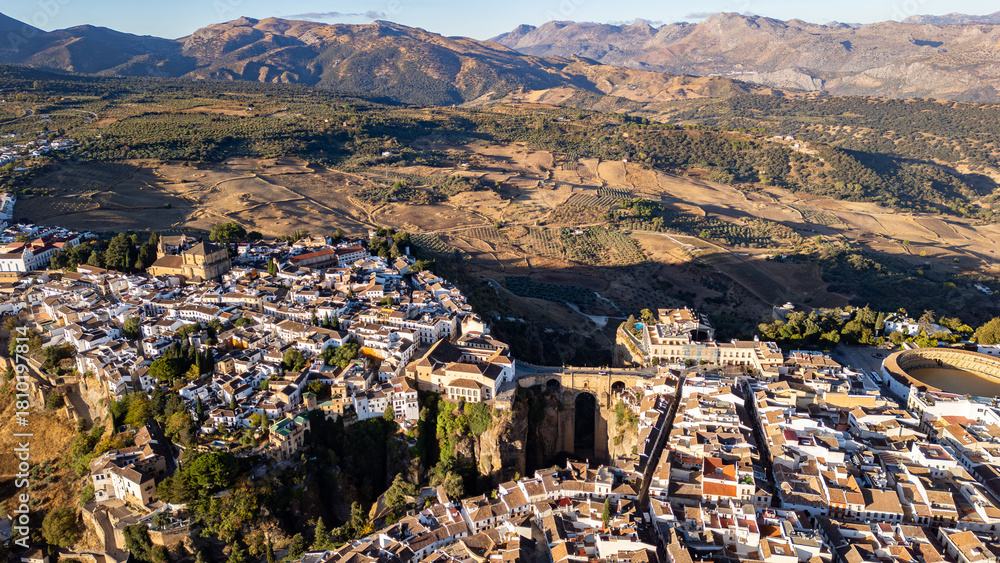 Naklejka premium Aerial view of Ronda landscape and buildings with Puente Nuevo Bridge, Andalusia, Spain