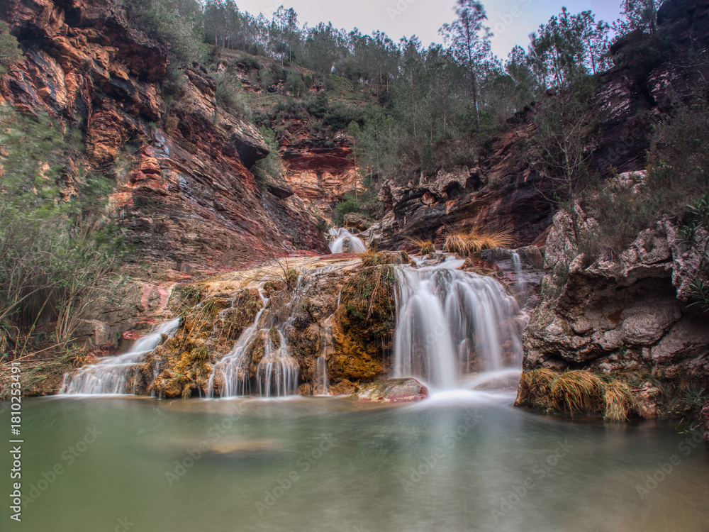 Fototapeta premium Natural waterfall in the mountains of Fuentes de Ayódar. 