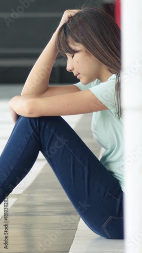 Asian teenager at high school victim of bullying. Vertical Video