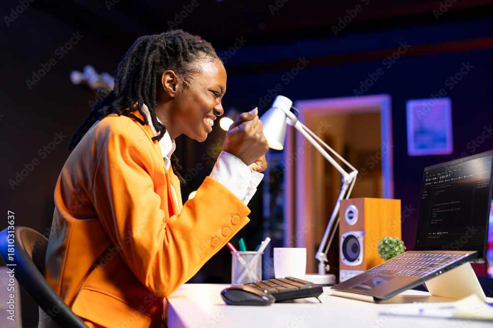 © DC Studio - Happy developer at laptop programming, exuberating after writing lines of code, using development tools. Ecstatic woman in home office pleased after finishing debugging software on notebook © DC Studio - Happy developer at laptop programming, exuberating after writing lines of code, using development tools. Ecstatic woman in home office pleased after finishing debugging software on notebook