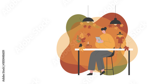 Cozy autumn workspace Woman reads tablet next to fall decor and hot drink