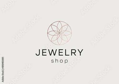 This image showcases a sophisticated jewelry shop logo featuring a floral design, elegantly balancing modern elegance with timeless beauty, perfect for branding in luxury markets.