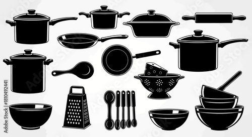 Collection of Black and White Kitchen Utensils and Cookware.