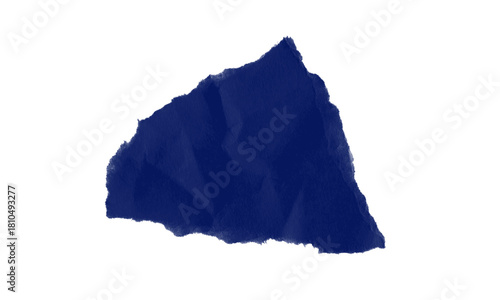 A single crumpled piece of dark blue paper isolated against a stark black background in a studio shot
