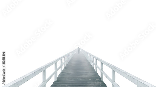 A long wooden pier or walkway extends into the distance with white railings on a dark void