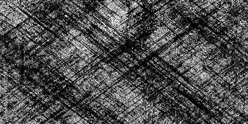 Dark black and white fabric, old leather, and grey metal combine in a rough, seamless textile pattern backdrop