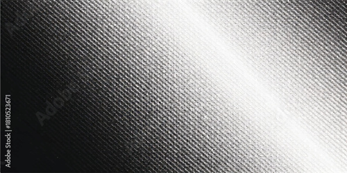 A brushed metal texture background featuring a dark silver steel pattern on the surface