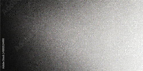 Brushed metal texture pattern of a dark grey abstract surface