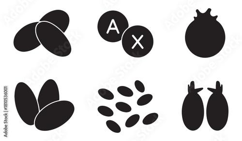  Collection of silhouetted objects including seeds letters and fruits on white background