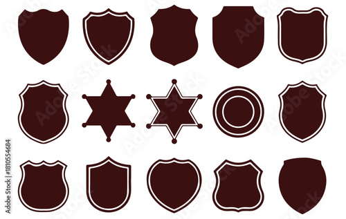 A diverse collection of blank shield silhouettes, police badges, and security emblem shapes for creating logos, labels, and crests