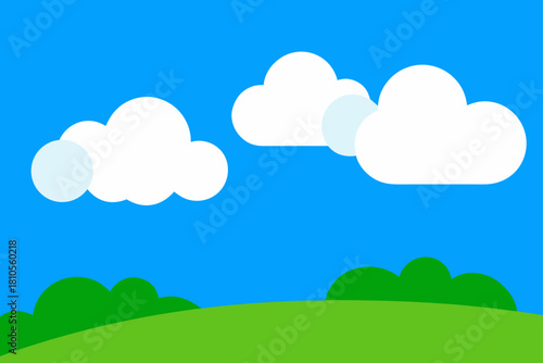 Bright blue sky with fluffy white clouds over green rolling hills