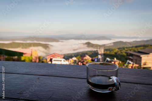 Coffee Cup on Table with Mountain View
