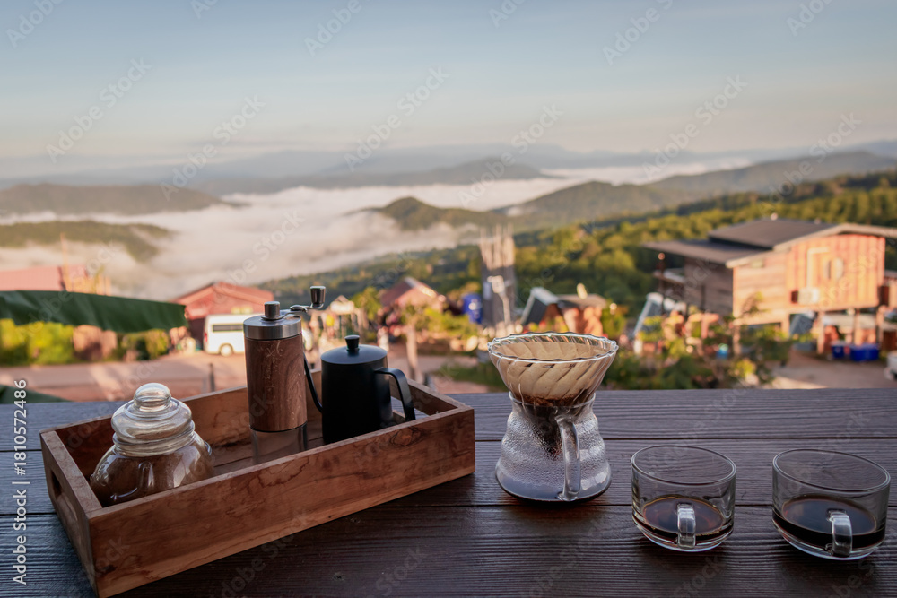 Fototapeta premium Coffee Cup on Table with Mountain View
