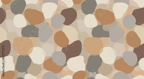 Abstract mosaic pattern with irregular beige, brown, gray, and cream