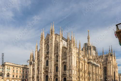 The Milan Cathedral (Duomo di Milano) in Italy  
with the Christmas tree and doves flying