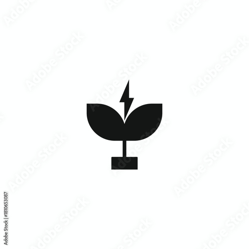 Solid black silhouette icon of a plant with a lightning bolt, symbolizing bio-energy, green power, sustainable electricity, and eco-friendly energy generation. Isolated vector graphic