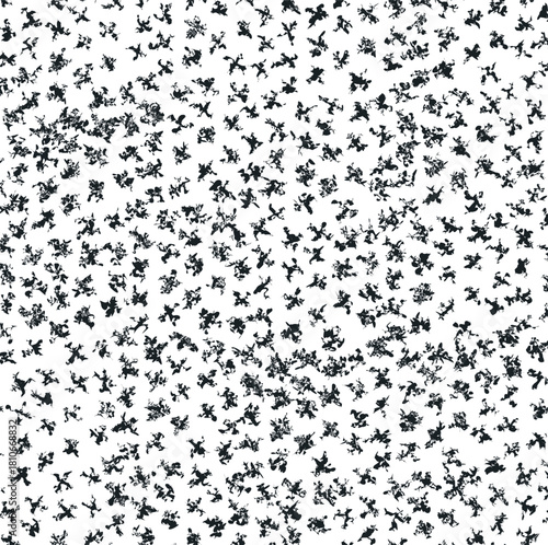 A noisy texture in the form of a dense cluster of small, dirty, torn spots.