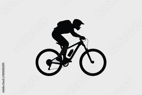 Mountain biker silhouette in action mountain biking cyclist