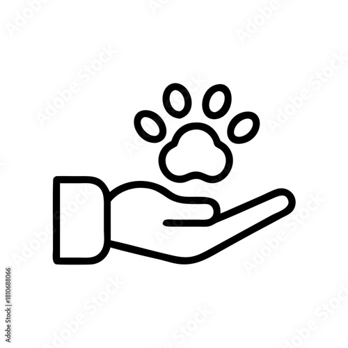 Hand holding paw print symbolizing pet care and companionship  