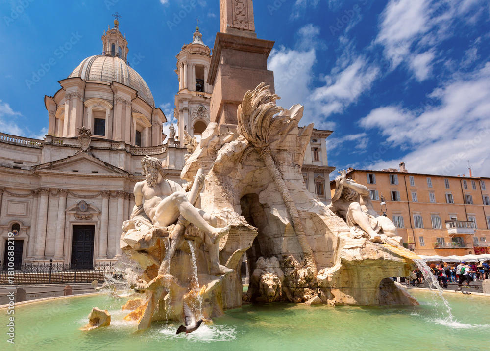 Naklejka premium Baroque Fountain of the Four Rivers with SantAgnese in Agone in Rome, Italy