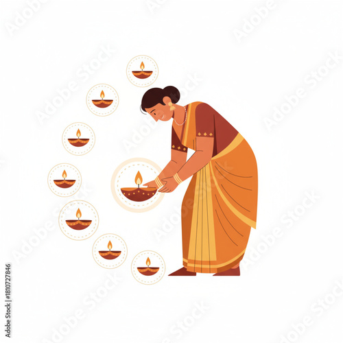 Indian woman in traditional saree lighting oil lamps or diyas for Diwali festival celebration.