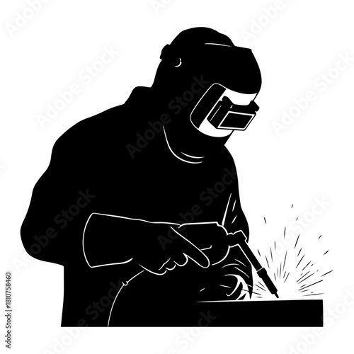 Silhouette of a welder working with sparks flying.