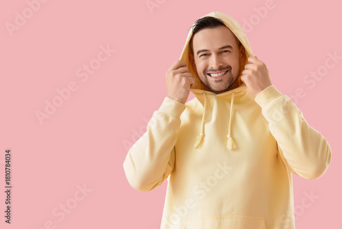Young man in hoodie with be...