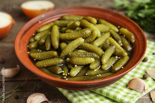 Bowl of pickled gherkins wi...