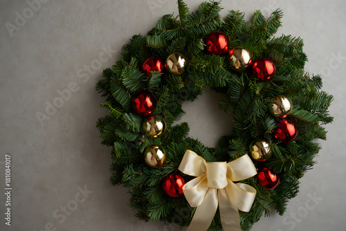 christmas wreath with red ribbon