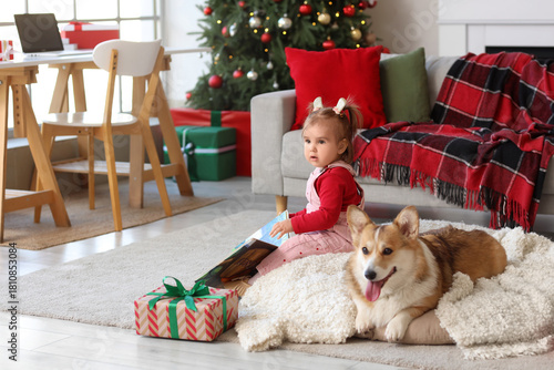 Cute little girl with Corgi...