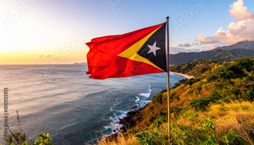 Timor-Leste Flag Waving Over Coastal Cliffside with Crashing Waves and Sunset Glow – A Cinematic Showcase of National Identity, Natural Majesty, and Cultural Pride in Ultra HD with Vibrant Colors 