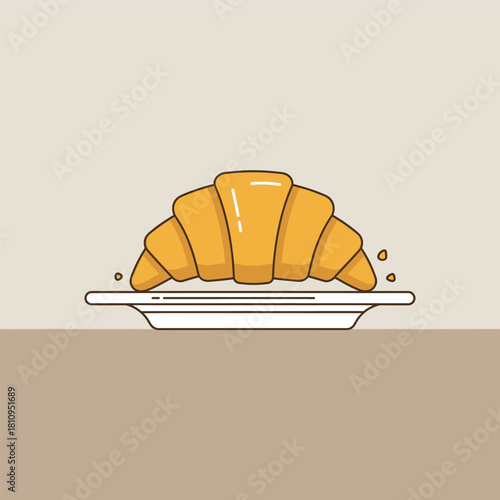 A golden croissant, freshly baked, rests on a white plate, ready to be enjoyed.