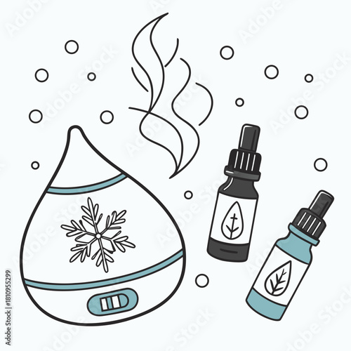Essential oils diffuser with snowflake design and oil bottles